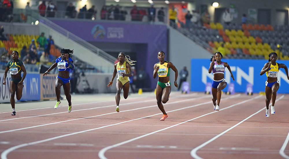 Alana Reid took 100 metres title in Lima. 